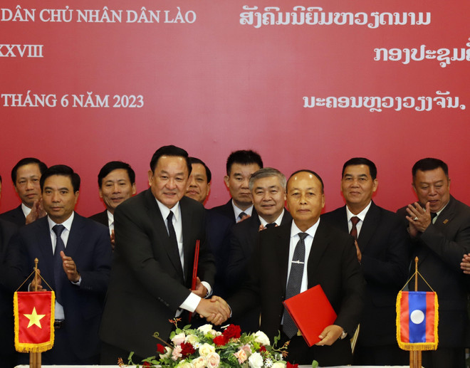 Việt Nam-Lào tăng cường hợp tác tìm kiếm, quy tập hài cốt liệt sỹ ảnh 1