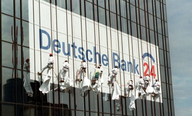 Ảnh minh họa. (Nguồn: AP) Deutsche Bank dự trù cần 8 tỷ euro để đối phó khủng hoảng ảnh 1