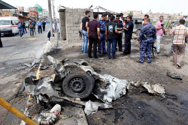 [Photo] Bạo lực leo thang tại Iraq, 70 người thương vong ảnh 2