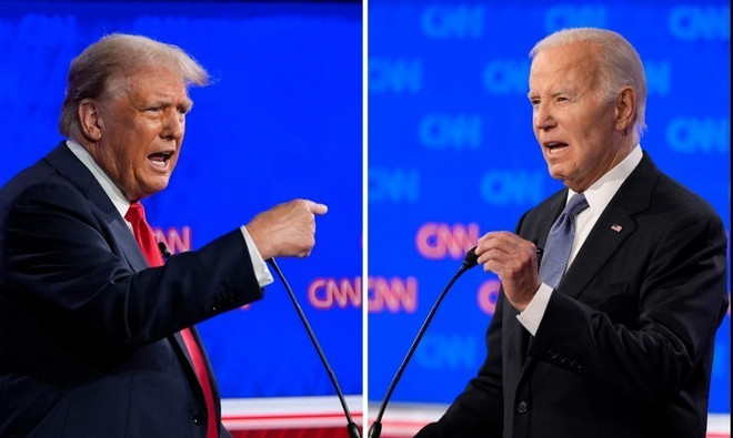 Tổng thống Mỹ Joe Biden (phải) và cựu Tổng thống Donald Trump tại cuộc tranh luận trực tiếp đầu tiên ở Atlanta, bang Georgia, Mỹ, ngày 27/6/2024. (Ảnh: CNN/TTXVN) ttxvn_trump biden.jpg