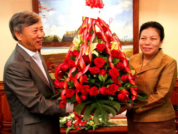 Việt Nam mừng 59 năm ngày thành lập Đảng NDCM Lào ảnh 1