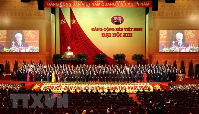 Quang cảnh lễ bế mạc Đại hội XIII của Đảng Cộng sản Việt Nam. (Ảnh: TTXVN) Đại sứ Việt Nam trao đổi với Đảng Cộng sản Nam Phi về kết quả Đại hội ảnh 1