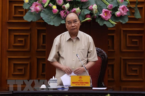 Thủ tướng Chính phủ Nguyễn Xuân Phúc. (Ảnh: Thống Nhất/TTXVN) Thủ tướng chỉ đạo nghiên cứu phản ánh của VietnamPlus về bất bình đẳng ảnh 1