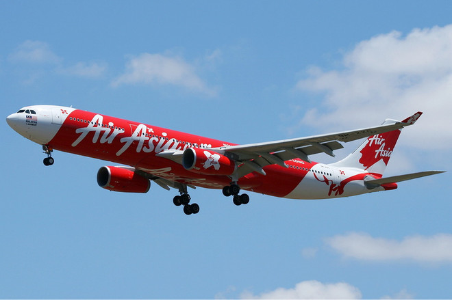 Lượng khách AirAsia chuyên chở tăng 25% trong năm 2013 ảnh 1