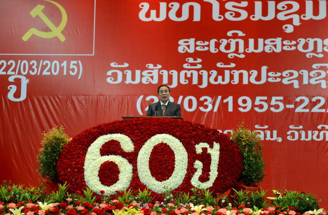 Míttinh kỷ niệm 60 năm thành lập Đảng Nhân dân Cách mạng Lào ảnh 1