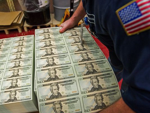 Đồng USD lên giá sau tuyên bố nâng lãi suất sớm hơn của Fed ảnh 1