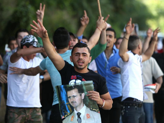 Người Syria tại hải ngoại bắt đầu bỏ phiếu bầu Tổng thống ảnh 1