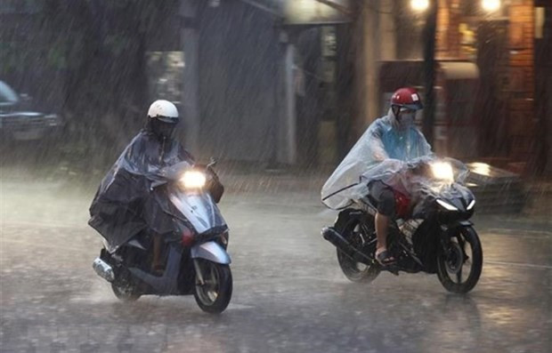 Mưa dông diễn ra ở cả ba miền. (Ảnh: Dương Giang/TTXVN) Ba miền có mưa dông, đề phòng lũ quét, sạt lở đất ở vùng núi ảnh 1