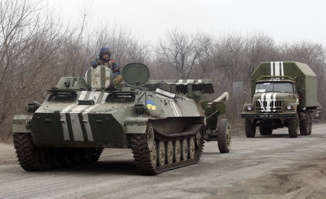 Quân đội Ukraine tiếp tục rút vũ khí hạng nặng ra khỏi Donbass ảnh 1