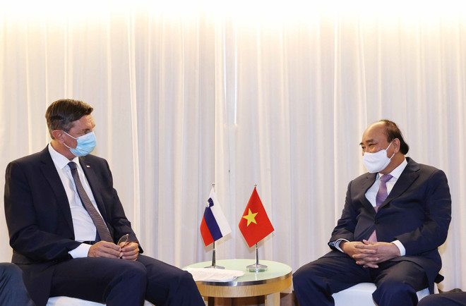 Chủ tịch nước Nguyễn Xuân Phúc gặp Tổng thống Slovenia Borut Pahor. (Ảnh: Thống Nhất/TTXVN) Chủ tịch nước Nguyễn Xuân Phúc gặp lãnh đạo các nước, tổ chức quốc tế ảnh 4