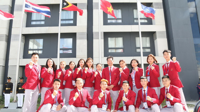 Đoàn thể thao Việt Nam thể hiện quyết tâm giành ít nhất 65 huy chương Vàng. (Ảnh: TTXVN) Đoàn Việt Nam đặt mục tiêu giành 65 huy chương Vàng SEA Games ảnh 2