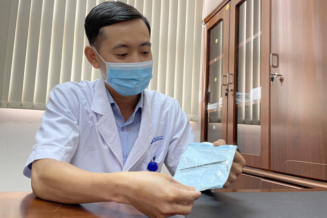 Lấy thành công cây đinh vít dài 15cm cắm trong dạ dày bệnh nhân ảnh 1