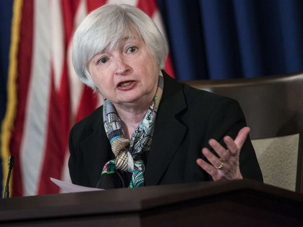 Fed hạ dự báo tăng trưởng kinh tế Mỹ xuống mức 2,2% ảnh 1