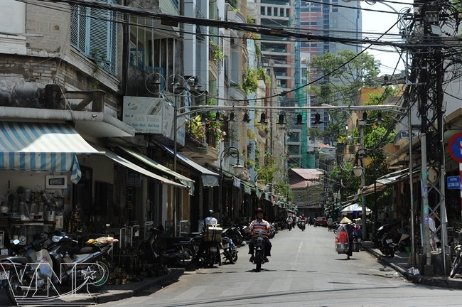 [Photo] Phố đồ cổ nằm giữa lòng Thành phố Hồ Chí Minh ảnh 1