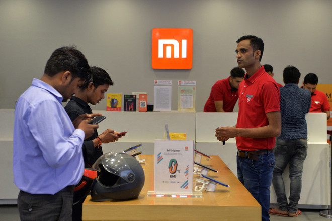 Một cửa hàng của hãng sản xuất điện thoại smartphone Xiaomi ở Gurgaon, Ấn Độ. (Ảnh: AFP/TTXVN) Thẩm phán Mỹ ra lệnh đưa Xiaomi của Trung Quốc khỏi "danh sách đen" ảnh 1