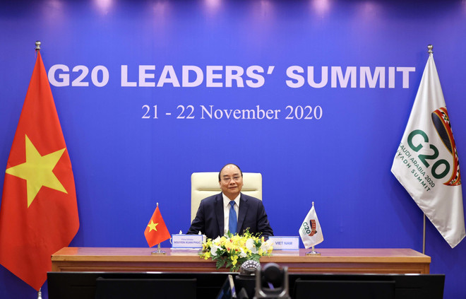 Thủ tướng Nguyễn Xuân Phúc tham dự Hội nghị thượng đỉnh G20. (Ảnh: Thống Nhất/TTXVN) G20 bàn giải pháp sử dụng mọi nguồn lực để ngăn chặn đại dịch COVID-19 ảnh 2