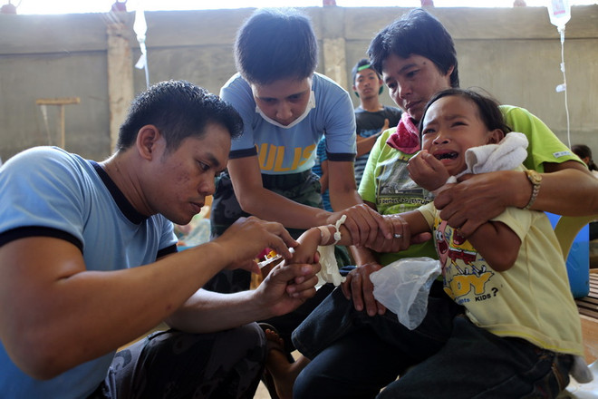 [Photo] Bùng phát dịch bệnh giống dịch tả tại Philippines ảnh 4
