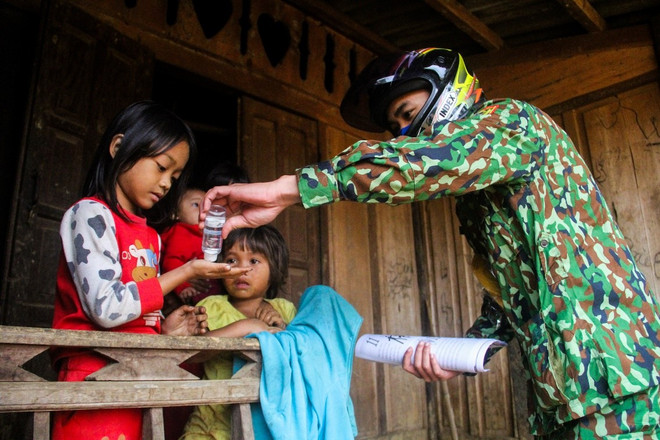 Hình ảnh Việt Nam chống COVID-19 trên màn hình Quảng trường Thời đại ảnh 7