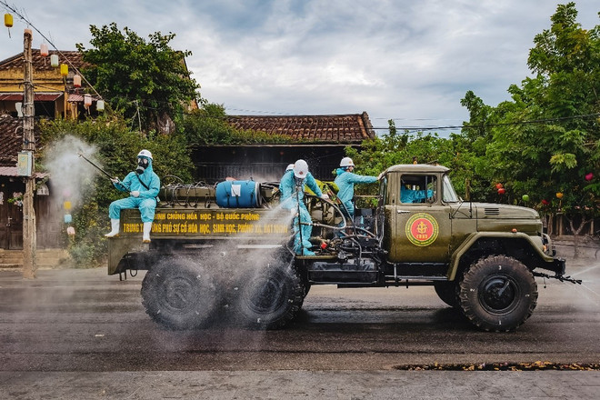 Hình ảnh Việt Nam chống COVID-19 trên màn hình Quảng trường Thời đại ảnh 6