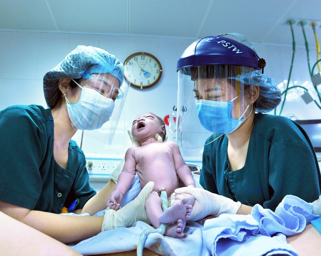 Hình ảnh Việt Nam chống COVID-19 trên màn hình Quảng trường Thời đại ảnh 4