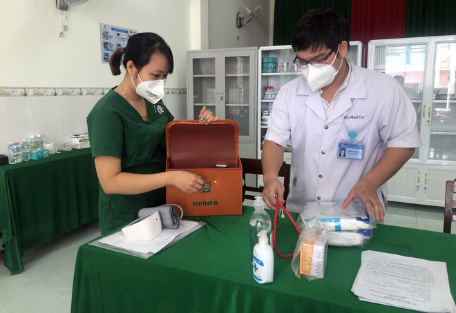 Vĩnh Long tăng cường năng lực trạm y tế lưu động điều trị F0 tại nhà ảnh 1