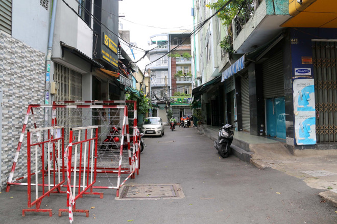 [Photo] TP Hồ Chí Minh tháo gỡ rào chắn nhiều con hẻm, tuyến đường ảnh 2