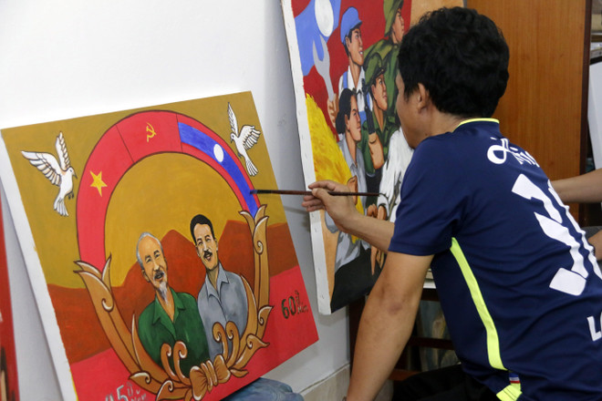 Quan hệ gắn bó Việt Nam-Lào thể hiện qua các tác phẩm nghệ thuật ảnh 2