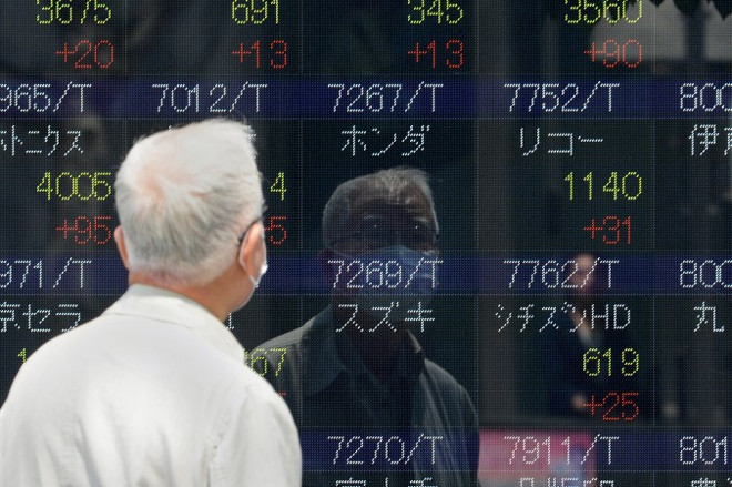 Tiếp đà tăng của Phố Wall, chứng khoán châu Á xanh sàn ảnh 1