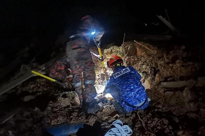 Lở đất tại Malaysia: Ít nhất 13 người thiệt mạng, 25 người còn mắc kẹt ảnh 6