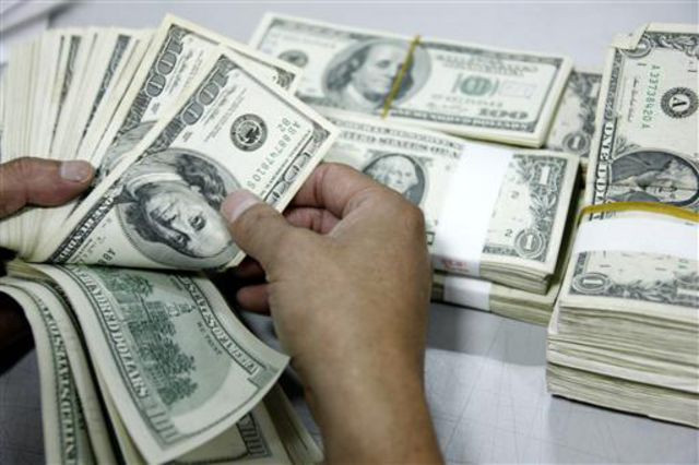 Ảnh minh họa. (Nguồn: Bloomberg) USD tăng giá nhờ tín hiệu tích cực của kinh tế Trung Quốc ảnh 1