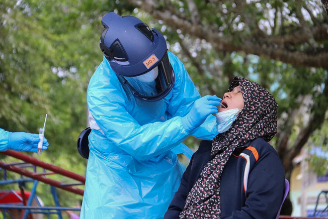 Dịch COVID-19: Malaysia ghi nhận kỷ lục số mũi tiêm chủng trong 1 ngày ảnh 2