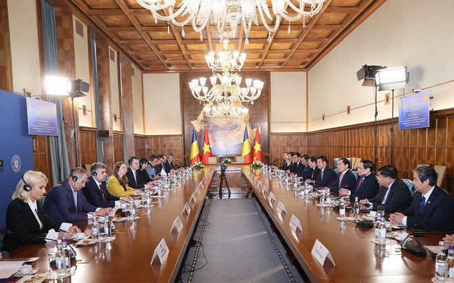 ttxvn_pham minh chinh romania 04.jpg