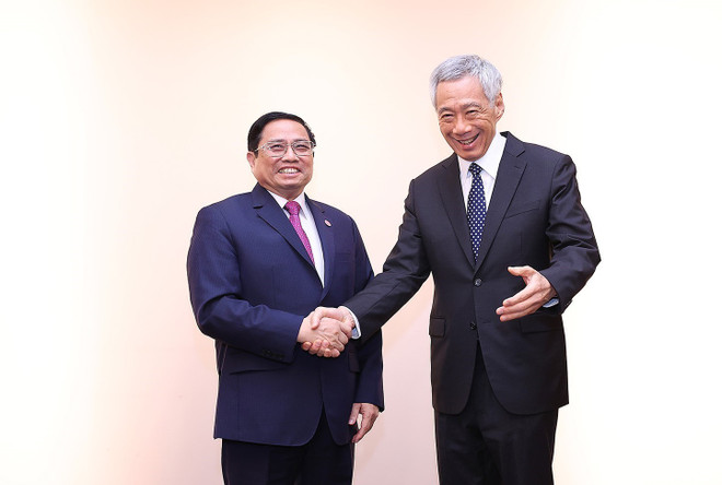 Thủ tướng Phạm Minh Chính gặp Thủ tướng Singapore Lý Hiển Long. (Ảnh: Dương Giang/TTXVN) Thủ tướng Phạm Minh Chính gặp Thủ tướng Singapore tại Hoa Kỳ ảnh 1