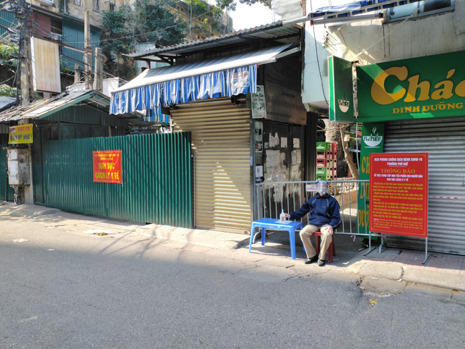 Hà Nội cách ly y tế khu chợ xanh và dãy nhà tập thể Nguyễn Công Trứ ảnh 1