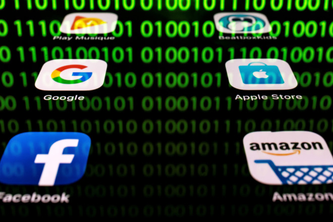 Biểu tượng của Amazon, Apple, Google và Facebook. (Ảnh: AFP/TTXVN) Tầm ảnh hưởng của các tập đoàn công nghệ đối với hàng tỷ người dùng ảnh 1