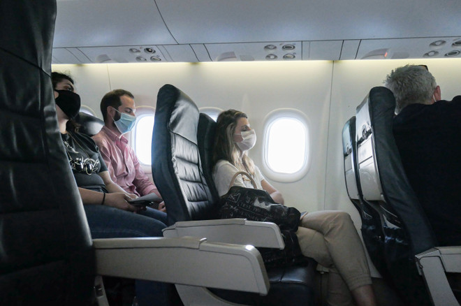 Nghiên cứu giả định về khả năng lây lan SARS-COV-2 trên các chuyến bay ảnh 1