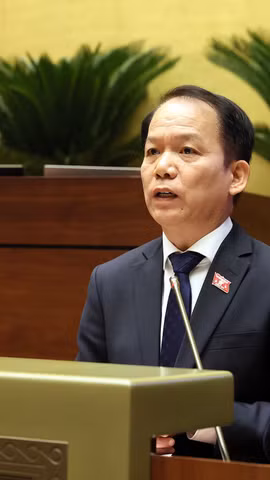Bộ trưởng Bộ Tư pháp Hoàng Thanh Tùng phát biểu giải trình, làm rõ một số vấn đề đại biểu Quốc hội nêu. (Ảnh: An Đăng/TTXVN)