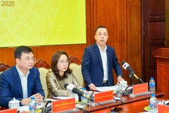 Ông Lê Hoàng Chính Quang, Cục trưởng Cục Công nghệ thông tin thông tin Ngân hàng Nhà nước chia sẻ tại họp báo. (Ảnh: Vietnam+)