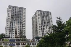Người trẻ dễ thở hơn trên hành trình mua nhà ở xã hội. (Ảnh: Vietnam+)