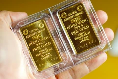 Dự thảo Nghị định 24 sẽ bỏ độc quyền Nhà nước về sản xuất vàng miếng. (Ảnh: Vietnam+)