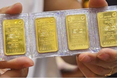 Vàng miếng SJC. (Ảnh: Vietnam+)
