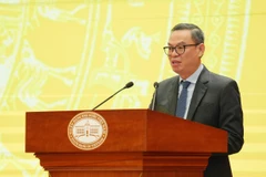 Ông Trần Minh Bình, Chủ tịch Hội đồng quản trị Ngân hàng Thương mại cổ phần Công thương Việt Nam phát biểu tại hội nghị. (Ảnh: Vietnam+)