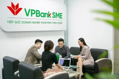 Chuyển mình làm doanh nghiệp: Khi hộ kinh doanh cần một bệ đỡ tài chính kịp thời. (Ảnh: Vietnam+)