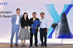 Với những hoạt động tích cực trên thị trường ngoại…aded tại buổi Lễ trao giải Vietnam FX Matching. (Ảnh: Vietnam+)