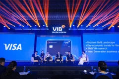 Visa, VIB và VNPAY giới thiệu giải pháp tài chính và số hóa cho doanh nghiệp. (Ảnh: Vietnam+)