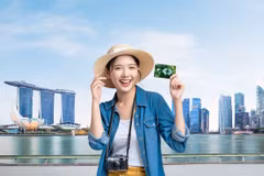  "Vi vu châu Á - Không phí ngoại tệ" cùng thẻ Techcombank. (Ảnh: Vietnam+)