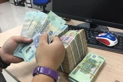 Hiệp hội Ngân hàng Việt Nam đề xuất nâng hạn mức cho vay tiêu dùng. (Ảnh: Vietnam+)