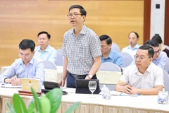Ông Nguyễn Duy Hoàng - Cục trưởng Cục Kiểm soát thủ tục hành chính Văn phòng Chính phủ trả lời họp báo Chính phủ chiều ngày 4/6. (Ảnh: Vietnam+)