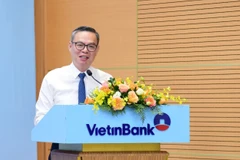Ông Trần Minh Bình – Chủ tịch HĐQT VietinBank phát biểu tại sự kiện. (Ảnh: Vietnam+)