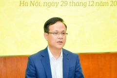 Ông Phạm Chí Quang, Vụ trưởng Vụ Chính sách tiền tệ Ngân hàng Nhà nước chia sẻ tại họp báo. (Ảnh: Vietnam+)